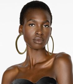 Make a bold statement with our Handcrafted Oversized Watusi Cattle Horn Hoop Earrings. These stunning 90MM hoops are meticulously crafted from ethically sourced Watusi cattle horn, showcasing its natural beauty and unique variations. Perfect for those who appreciate distinctive, nature-inspired jewelry, these oversized hoops add a touch of elegance and sophistication to any outfit. Ideal for both casual and formal occasions, they celebrate the artistry of nature and exceptional craftsmanship. Mo Watusi Cattle, Dark Skin Women, Nature Inspired Jewelry, Inspired Jewelry, Nature Inspired, Modern Woman, Horn, Nature Inspiration, Natural Beauty