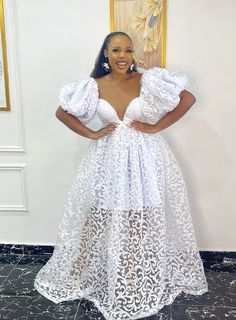 We are here to always make you smile. Meet MIRABEL a dress that speaks volume and always light up the room . Made with love , color and beautiful prints. A dress to draw all attention to you when you walk pass that crowd. White Dress African Style, White Traditional Dress African, Vintage Gown Styles, All White African Outfit For Women, Bridal Lace Styles, Lace African Dress Style, White African Dress, Ankara Bridal Dress Styles, White Ankara Dress