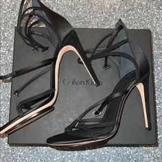 Calvin Klein Collection Black Satin Heels, Absolutely Stunning Shoes, Buckles And Satin Straps, 4.5 Heel, Size 39(9). Original Price $1,065.00! New In Box Designer Open Heel Heels For Gala, Evening Heels With Branded Heel Counter, Designer High Heels With Wrapped Heel, Designer Ankle Strap Heels For Events, Designer High Heels With Heel Strap, Designer Heels With Wrapped Open Heel, Luxury Evening Heels With Wrapped Heel, Designer Heels With Wrapped Heel For Events, Designer Sculpted Heel For Gala