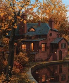 a painting of a red brick house next to a pond and trees with yellow leaves