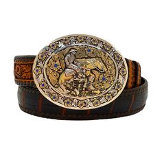 As stunning as the Western riding competition for horses where the riders guide the horses through a precise pattern of circles, spins, and stops this buckle buckle captures the beauty and essence of the Reining sport. Meticulously handcrafted, at the bench of master silversmith Richard Stump, in 14K and sterling silver with sapphires, the Reining Belt Buckle is a must for the serious collector of Wester wearable art. Tom Taylor handmade leather belt straps are sold separately. Tom Taylor, Reining Horses, Handmade Leather Belt, Western Riding, Leather Belt, Belt Buckles, Wearable Art, Leather Handmade, Buckle