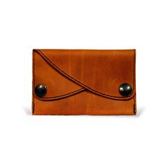 The perfect purse, wallet for the minimalist person. Two compartments closed with snap fasteners make it possible to sort money and cards. Made from fine, robust cowhide leather. The classic design is practical and fits any everyday style. Minimalist Leather Trifold Wallet For Everyday, Brown Wallets With Snap Closure For Everyday Use, Brown Waxed Finish Wallets For Everyday Carry, Brown Wallet With Snap Closure For Everyday Use, Minimalist Leather Coin Purse, Brown Coin Purse With Snap Closure For Everyday, Everyday Brown Coin Purse With Snap Closure, Brown Bifold Coin Purse For Everyday, Brown Trifold Coin Purse For Everyday Use