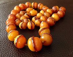 Find many great new & used options and get the best deals for RARE Authentic OLD Victorian to ArtDeco EGG YOLK BUTTER SCOTCH amber necklace at the best online prices at eBay! Free shipping for many products! Butter Scotch, Amber Bead Necklace, Baltic Amber Necklace, Textile Jewelry, Amber Necklace, Amber Beads, Coral Necklace, Caramel Color, Amber Jewelry