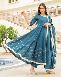 This 3 Pc anarkali Suit set is designed in mul-mul cotton fabric with Gota work mul-mul Dupatta. Kurta Length - 50, Mul-mul Cotton, Gota work With on hem & sleeves. Pant length - 38, Mul-mul cotton. Dupatta - Mul-mul cotton, gota work on edges. Fabric - mul-mul cotton. Color - Bottle Green CARE: dry clean only. Shipping - 10-12 working days. DISCLAIMER - The color of the product may be differ from the image 10-12% due to camera and lights and screen settings of device. Anarkali Set With Cutdana In Mulmul, Diwali Anarkali Set With Cutdana In Mulmul, Festive Chanderi Handloom Palazzo Set, Mulmul Anarkali Set With Gota Work, Navratri Anarkali Set With Cutdana In Mulmul, Unstitched Cotton Silk Anarkali Set For Navratri, Mulmul Anarkali Set With Traditional Drape For Diwali, Festive Handloom Chanderi Palazzo Set, Navratri Cutdana Anarkali Set In Mulmul