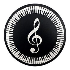 a black and white piano with a musical note on it