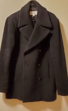 Reiss Textured Wool Teddy Coat. Double Breasted W/ Two Exterior Pockets. Textured Wool Give Coat A "Teddy Bear" Feel. Fully Lined With One Interior Breast Pocket. 100% Wool Exterior, Lining Is Polyster. Great Condition. A Rare Find!! Fits Size 42 Chest. Designer Black Pea Coat With Double Button Closure, Designer Black Wool Pea Coat, Designer Black Pea Coat With Button Closure, Designer Black Double-breasted Pea Coat, Black Double-breasted Peacoat For Business, Designer Black Wool Outerwear, Black Designer Wool Outerwear, Black Double-breasted Peacoat For Formal Occasions, Designer Pea Coat For Business In Winter