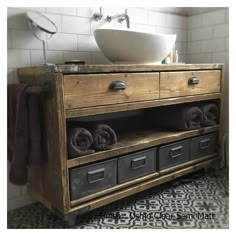 a bathroom with a sink and towel rack