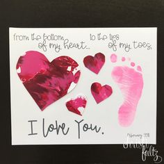 valentine's day card with handprinted hearts and i love you written on it