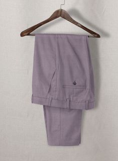 Make a voguish and exclusive update in your wardrobe with our Napolean Lavender Wool Pants that steal the spotlight off of everyone. Crafted with a wool blend, our pants exude poise in such a way that helps you project your extraordinary personality. Their lavender color looks unique and makes you the most prominent person in the room. So be one of a kind by wearing these pairs that promise nothing but admiration for you. 
 
 Look Includes  Napolean Lavander Wool Fabric  Cross Pocket  Flat Front Lavender High-waist Bottoms With Pockets, Purple Tailored Single-breasted Suit, Lavender Suit, Lavender Straight-leg Pants With Pockets, Full-length Purple Elastane Pants, Men’s Wool Pants, Brown Corduroy Jacket, Grey Wool Suit, Blue Linen Shirt