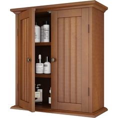 a wooden cabinet with two doors and several bottles on it's shelves in front of a white background