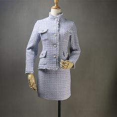 Elevate your style with our exquisite Women's Custom Made High Neck Pearl Buttons Blue Tweed Jacket + Skirt/Shorts Suit. This sophisticated ensemble combines the elegance of a high neck, the charm of pearl buttons, and the timeless appeal of blue tweed, making it the perfect choice for weddings, formal occasions, Speech Day, and showcasing office elegance. Features: Classic Blue Tweed: Crafted in a classic blue tweed pattern, this jacket and skirt/shorts combo exudes sophistication and versatili Tweed Jacket And Skirt, Blue Tweed Jacket, Tweed Skirt Suit, Plaid Bodycon Dress, Office Suit, Tweed Suit, High Neck Designs, Skirt Shorts, Blue Tweed