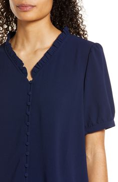 A frilly neckline and gently puffed sleeves add charm points to this staple blouse. 24" length (size Medium) V-neck Short sleeves 98% polyester, 2% spandex Machine wash, tumble dry Imported Blouse Nordstrom, No Frills, Puff Sleeve, Button Up, Short Sleeves, Nordstrom, V Neck, Women's Top