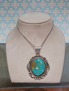 Circa 2000, handmade sterling silver Royston turquoise pendant. Marked sterling and signed "B Lee". Measures approx. 61 x 43mm. Weighs 21.7 grams. Older patina is prevalent; however, polishing can be provided prior to shipping with an extra fee, should you desire. A chain is not included. Thanks for looking. ERA - Circa 2000, Vintage METAL / MATERIAL - Sterling Silver  SIZE / MEASUREMENTS -  Measures approx. 61 x 43mm. Weighs 21.7 grams.  CONDITION - Older patina is prevalent, however polishing Silver Turquoise Necklace With Large Pendant, Southwestern Sterling Silver Turquoise Cabochon Necklace, Western Style Collectible Turquoise Sterling Silver Necklace, Southwestern Silver Turquoise Necklace With Patina, Handmade Western Silver Turquoise Necklace, Southwestern Silver Oval Turquoise Necklace, Western Style Silver Turquoise Necklace With Large Pendant, Silver Oval Turquoise Necklace Collectible, Silver Oval Turquoise Collectible Necklace