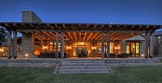 an outdoor covered patio with steps leading up to it