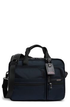 An organizer laptop briefcase is perfect for keeping items stored safely all while securing your laptop. 12" x 16" x 5.5" Top carry handle
 Top zip closure Exterior zip pocket Ballistic nylon, leather trim Imported Nylon Laptop Bag With Zipper For Business Trips, Rectangular Nylon Laptop Bag With Sleeve, Nylon Laptop Bag With Sleeve, Business Briefcase With Luggage Sleeve In Nylon, Business Laptop Bag With Laptop Sleeve In Nylon, Nylon Laptop Bag With Sleeve For Business, Business Laptop Bag With Padded Nylon, Business Nylon Laptop Bag With Sleeve, Nylon Briefcase With Luggage Sleeve For Business