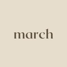 the word march written in brown on a beige background