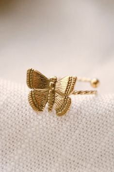 Stainless Steel Water resistance Minimalist Adjustable Gold Butterfly Ring, Gold Metal Butterfly Ring As Gift, Adjustable Metal Butterfly Ring, Gold Butterfly Ring With Butterfly Charm, Unique Sterling Silver Nickel-free Butterfly Ring, Nickel-free Sterling Silver Butterfly Ring Gift, Adjustable Gold-colored Sterling Silver Butterfly Ring, Butterfly Ring, Steel Water