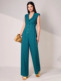 This teal blue elegant Lapel Collar Wide Bottom Jumpsuit is perfect for any occasion! Featuring a plain pattern, this dress is detailed with subtle pleats and a button-front closure. It has a long length, a regular fit, a lapel neckline, and is sleeveless. Whether you're looking for something to wear to a formal event or just a night out, this dress is perfect for you! Specifications: Color: Teal Blue Style: Elegant Pattern Type: Plain Details: Plicated, Button Front Length: Long Fit Type: Regul Style Bleu, Elegant Pattern, Clean Body, Blue Style, Style Elegant, Lapel Collar, Long Length, Teal Blue, Blue Fashion