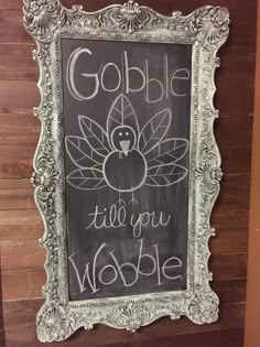 a chalkboard sign that says gobble till you wobble