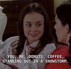 two girls talking to each other in front of a white vase with the words you, me, donuts, coffee, standing out in a snowstorm