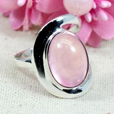 Natural Rose Quartz 925 Sterling Silver Pink Stone Simple Beautiful Boho Stacking Handmade Men Women Ring Anniversary Gift Ring Jewelry. Description : Gemstone : Natural Rose Quartz Metal : 925 Sterling Silver Stone Size : 14 x 10 MM Approx Stone Shape :- Oval Cabochon Stamp :- 925 Weight : 4.89 Gram Approx handmade Item **Made to order** **This ring you will receive may vary from the image as no two gemstones are similar and images cannot define exact product definitions. ** Shipping Policy:- W Handmade Pink Rings For Anniversary, Pink Cabochon Jewelry For Anniversary, Hallmarked Pink Round Rings, Pink Ring With Polished Finish, Silver Rose Quartz Crystal Ring Gift, Handmade Pink Crystal Ring For Anniversary, Pink Wedding Rings With Polished Finish, Adjustable Pink Rings Stamped 925, Adjustable Pink Ring Stamped 925