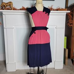 I Kept Meaning To Wear This, And It Just Continues To Sit Unworn. 40s Vintage Pinafore With Button Details At Shoulder And At Pocket. Buttons Up The Side To Close. Measurements: Chest: 32-36" Waist: 25-26" Waist To Hem: Shoulder To Waist: Condition: Excellent. No Rips Or Stains That I Could Find. I Did Adjust The Top To Have A Longer Torso, So You Can See A Little Remnant Of Stitch Line Where It Used To Be. Retro Pink Dress With Buttons, Retro Pink Dress With Button Closure, Vintage Pink Dress With Button Closure, Pink Vintage Dress With Button Closure, Pink Retro Dress For Work, Retro Pink Dress For Work, Vintage Pink Dress For Work, Vintage Pinafore, Stitch Lines