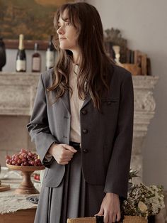 This is a basic blazer made with 100% polyester that is flexible and light. It features three buttons and practical pockets at the front.- Appropriate length allowing for versatile looks- Semi-oversized fit for comfortable wear experience- Modern gray color to add appeal to the item Professional Long Sleeve Outerwear With Double Button Closure, Professional Long Sleeve Single Breasted Outerwear, Casual Suits With Button Closure For Office, Casual Office Suits With Button Closure, Professional Double-breasted Fall Outerwear, Professional Double-breasted Outerwear For Fall, Professional Blazer With Button Closure For Fall, Professional Fall Blazer With Button Closure, Professional Fall Outerwear With Suit Collar