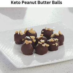 chocolate covered peanut butter balls on a white plate with text that reads, keto peanut butter balls