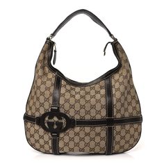 This is an authentic GUCCI Monogram GG Royal Hobo in Dark Brown. This stylish hobo is crafted of Gucci GG monogram canvas. The shoulder bag features a looping brown leather shoulder strap with small polished brass links and a harness of leather trim featuring a brown interlocking GG logo. There is leather trim along the top edge of the bag opening that leads to a mocha fabric interior with zipper and patch pockets. Gg Monogram, Gucci Monogram, Gg Logo, Gucci Shoulder Bag, Bag Light, Chain Shoulder Bag, Chain Bags, Blue Bags, Polished Brass