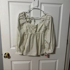 Size Xxs Open Edit Ivory Blouse 100% Cotton. New With Tags Retails For $65.00 A Little Wrinkled From Being Stored, But Nothing An Iron Or Steaming Couldn’t Fix White Lace Tank Top, Hippie Blouse, Ivory Blouse, Bell Sleeve Shirt, Haute Hippie, Ivory Tops, Cold Shoulder Blouse, Polka Dot Blouse, Lace Tank Top