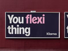 two billboards on the side of a building that say you flexin't