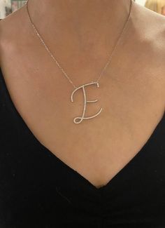 "Personalized initial letter - Makes the perfect gift for you or birthday gift, or anyone you love! Material: Sterling Silver; Cubic zircon Measurements:About 4.5x4 cm / 1.77x1.57 inch dependents on the letter Large Initial Necklace set with AAA quality Cubic Zircon stones. Please with in \"Add your personalization\" the letter that you need. The Necklace is in one length 15 + 2 inch extension chain The necklace will be sent gift-wrapped and packed in a padded envelope to maintain the product Th Elegant Cubic Zirconia Initial Necklace Gift, Silver Diamond Initial Necklace For Gift, Initial Pendant Necklace With Diamond Accents As Gift, Diamond Accented Initial Pendant Necklace Gift, Diamond White Initial Pendant Necklace For Gift, Gift Round Initial Necklace With Diamond Accents, Silver Cubic Zirconia Initial Necklace For Gift, White Gold Initial Necklace With Diamond Accents As Gift, Gift Diamond Accents Initial Pendant Name Necklace