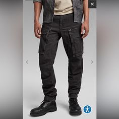 Men’s Rovic Zip Regular Tapered Cargo Pants Price Is Firm At $130. All 32 Length. Color: Black Condition: 10/10 New W Tags Rugged Streetwear Bottoms With Belt Loops, Rugged Bottoms With Belt Loops For Streetwear, Rugged Straight Leg Pants For Streetwear, Rugged Cargo Bottoms For Streetwear, Rugged Relaxed Fit Bottoms For Streetwear, Rugged Streetwear Pants With Pockets, Rugged Cargo Pants With Cargo Pockets For Streetwear, Rugged Cargo Pants For Streetwear, Tapered Cargo Pants