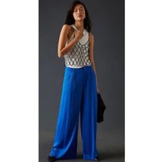 Anthropologie Low-Rise Blue Pleated Satin Pants - Size 12 Enjoy The Comfort Of These Low-Rise Blue Silky Pleated Pants By Anthropologie Size 12 In Women's. With A Flowing Silhouette, You Will Love Their Versatility. The Material Is Viscose. Measurements: 9.75" Rise 32" Inseam 14.75" Leg Opening 17" Waist Lying Flat Perfect For Special Occasions Or Daily Wear. It's A Gorgeous Blue! These Anthropologie Satin Pants Come With Side Slant Pockets, Zip Front, And Welt Pockets In The Back And Are A Size Boho Loungewear, Dress Pants Casual, Women Dress Pants, Striped Flare Pants, Silky Pants, Grey Cargo Pants, Tie Waist Jumpsuit, Size 12 Women, Wide Leg Crop Pants