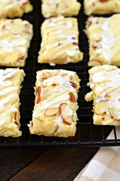 several pieces of cake sitting on top of a cooling rack