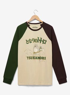 Relax and enjoy the view with the spirits of the forest! Featuring Totoro  Chibi Totoro  and Chu Totoro sitting on a tree branch above "Tsukamori" lettering  this shirt includes two different colored sleeves  perfect for picnics  hikes  and movie nights.A BoxLunch Exclusive!Organic cottonListed in unisex sizesWash cold with like colors; dry lowDo not iron over printImported Spirits Of The Forest, Chibi Totoro, Studio Ghibli My Neighbor Totoro, Ghibli My Neighbor Totoro, Group Portrait, Jersey Jacket, Cardigan Sweater Dress, My Neighbor Totoro, Sleepwear Sets