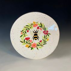 Hand built and painted. Decor plate stand available for additional purchase- message seller for additional info. Pottery Painting Ideas, Bee Flowers, Painted Decor, Plate Stand, Flowers Decor, Reno Nv, Plate Stands, Painted Porcelain, Pottery Painting