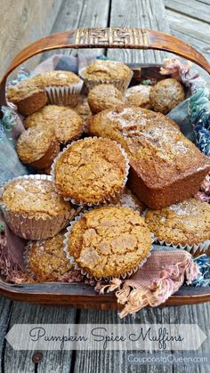 pumpkin spice muffins in a basket on a wooden table