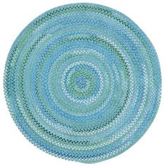 a blue and green circular rug on a white background