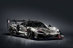 the new toyota sports car is shown in an image that appears to be painted with camouflage