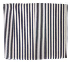 a blue and white striped pillow on a white background