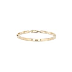 a yellow gold ring on a white background