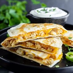 three quesadillas stacked on top of each other