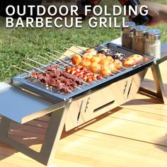 an outdoor bbq grill with food on it and the words, outdoor folding barbecue grill