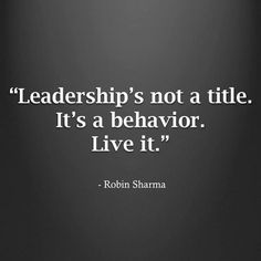 a black and white photo with the quote,'leaders not a title it's a behavior live it '