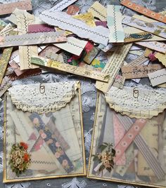 several pieces of paper with lace and flowers on them