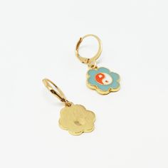 Classic, delicate earrings that lend a nostalgic yet whimsical vibe. Color: Teal, Orange, White, Gold Material: Alloy Dimensions: 1.25"L Overall, 0.5" Pendant Diameter Teal Earrings, Teal Orange, Delicate Earrings, Orange White, Gold Material, White Gold, Pastel, Personalized Items, Orange