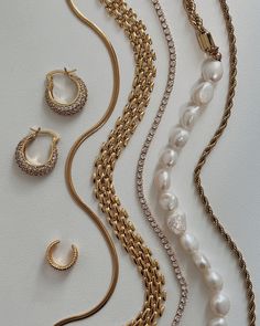 ✨ Deck Your Holiday Look with Aurous Atelier ✨ This festive season, let your style shine brighter than the Christmas lights with our exclusive collection of gold-toned treasures! From sparkling gemstone hoops that whisper elegance to classic pearls that exude grace, and statement chains that shout luxury – we’ve curated 7 essential pieces to elevate your holiday ensemble without stretching your budget. Whether you’re sipping mulled wine by the fireplace or dancing away at year-end parties,... Mulled Wine, Holiday Looks, Festive Season, Shine Bright, Exclusive Collection, The Christmas, Festival Season, Christmas Lights