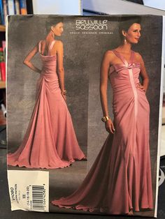 an image of a woman in a dress on the cover of a sewing pattern book