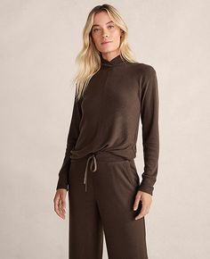 Haven Well Within. A thoughtful collection of lounge, sleep, home, and lifestyle essentials — and your trusted resource for all things wellbeing. A true classic, updated. Designed with a crossover neckline and contrasting diagonal ribbing that meets at a flattering center seam. All in a relaxed, casual silhouette. Mock neck. Long sleeves.,Hit:22 1/2" long,Imported:Imported,Fit:Hits at hip,Fabrication:74% LENZING™ ECOVERO™ Viscose, 23% Recycled Polyester, 3% Spandex,Garment Care:Machine Washable Haven Well Within Sweater Knit Crossover Mock Neck Top by Ann Taylor Size regular - XS Chocolate Women's Mock, Neck, Long, Sleeve, 74%, LENZING™, ECOVERO™, Viscose, 23%, Recycled, Polyester, 3%, Spandex, Machine, Washable Best Fall Sweaters Mock Neck Long Sleeve, Mock Neck Top, Fall Sweaters, Sweater Knit, Effortless Style, Crossover, Mock Neck, Ann Taylor, Knitted Sweaters